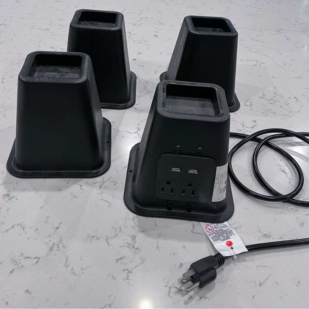 Set of 4 bed/furniture risers includes 2 USB ports and 2 electrical outlets